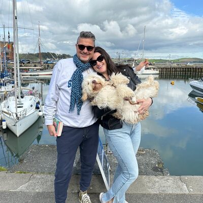 Ben and Morgan by the harbour, Morgan holding Stanley Pucci